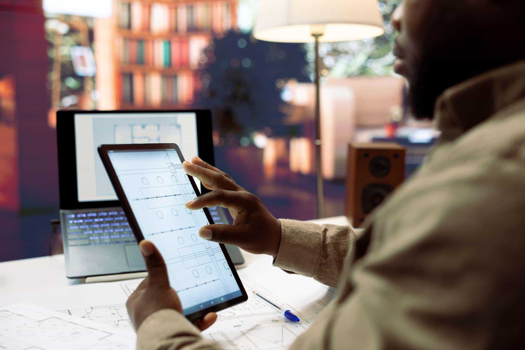 Person studies digital content at desk